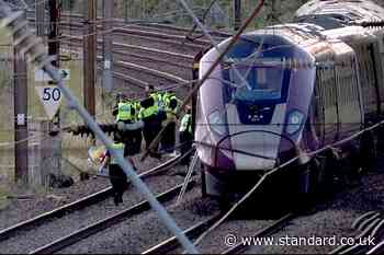 One dead and dozens seriously injured as two trains collide near Bedford