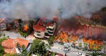 1 killed in large fire at luxury resort, several others injured