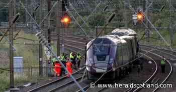 Train driver killed and dozens seriously injured as two trains collide near Bedford