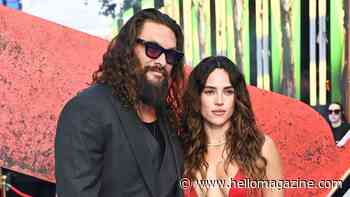 Jason Momoa is loved up with girlfriend Adria Arjona at Supergirl event