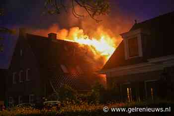 Grote uitslaande woningbrand na harde knal