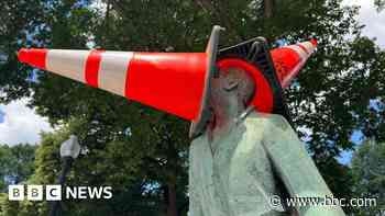 Why are Scotland fans putting traffic cones on statues in Boston?