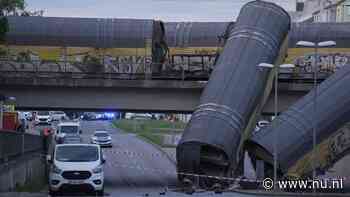 Persoon zwaargewond doordat treinwagons van brug storten in München