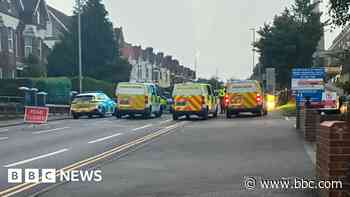 Murder arrests after man, 18, found near hospital dies