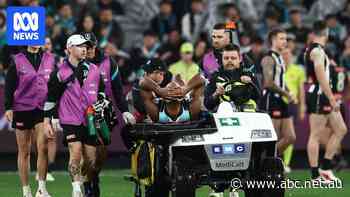 Live: Port star taken off on a stretcher after equalling AFL record
