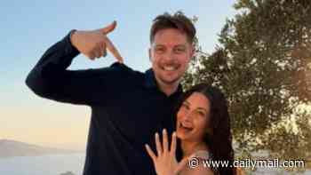 Dr Alex George is engaged! Former Love Island star pops the question to his mystery girlfriend during a romantic trip to Greece