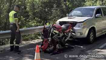 British biker, 64, is fighting for his life in hospital after his motorbike crashed head-on into a car in Spain