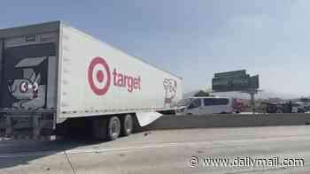 Woman killed, dozens hurt after Target semi truck crosses California freeway divider