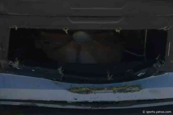 Metal cover comes up and tears through the nose of NASCAR O'Reilly car, stopping race