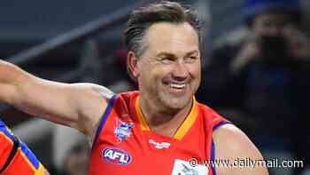 AFL great Tony Modra WAKES UP after catastrophic truck smash as details emerge about his 'appearance-altering' injuries and wife opens up about near-disaster