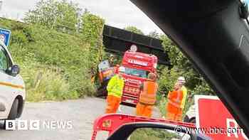 Heritage rail line suspended after lorry hits bridge
