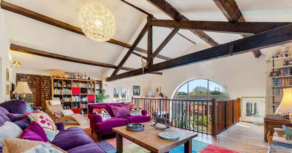 £1.2m Hale Village barn conversion with 9 bedrooms and business attached up for sale
