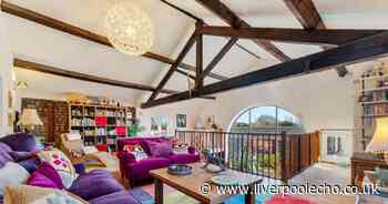 £1.2m Hale Village barn conversion with 9 bedrooms and business attached up for sale