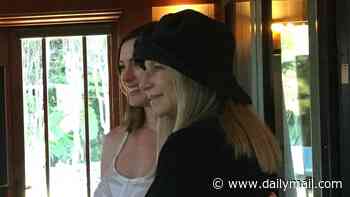 Barbra Streisand, 84, cradles pregnant Anne Hathaway's baby bump in affectionate photo after the actress, 43, announced she was expecting