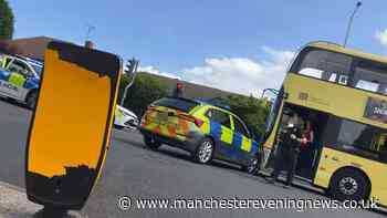 Traffic chaos as police car on 999 call and Bee Network bus crash on Stockport road