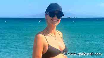 Pregnant Vogue Williams displays her blossoming bump in a bikini on holiday with husband Spencer Matthews in Mykonos