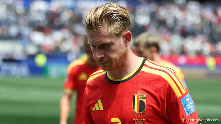 Ten-man Belgium held by Iran for second World Cup draw