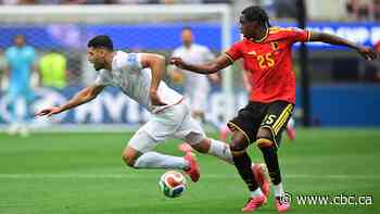 Iran plays 10-man Belgium to goalless draw at World Cup