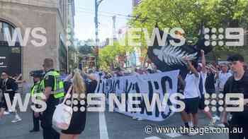 Kiwi fans march through the streets