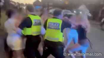 Police probe video showing officers attacking group of young girls with baton and Tasers as fight breaks out on Rotherham street