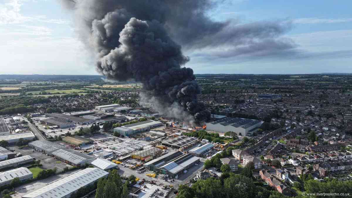 Widnes fire live as crews to work into the night to tackle blaze