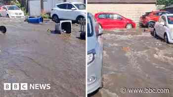 Burst water pipe floods homes and gardens