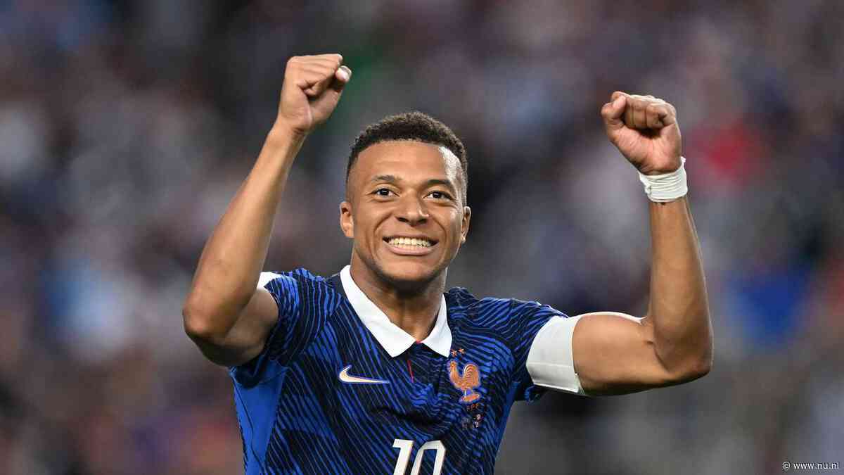 Mbappé loodst Frankrijk langs Irak in door noodweer langdurig onderbroken duel