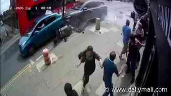 Moment car ploughs into crowd before fleeing scene - injuring six: Police hunting 'hit-and-run' driver