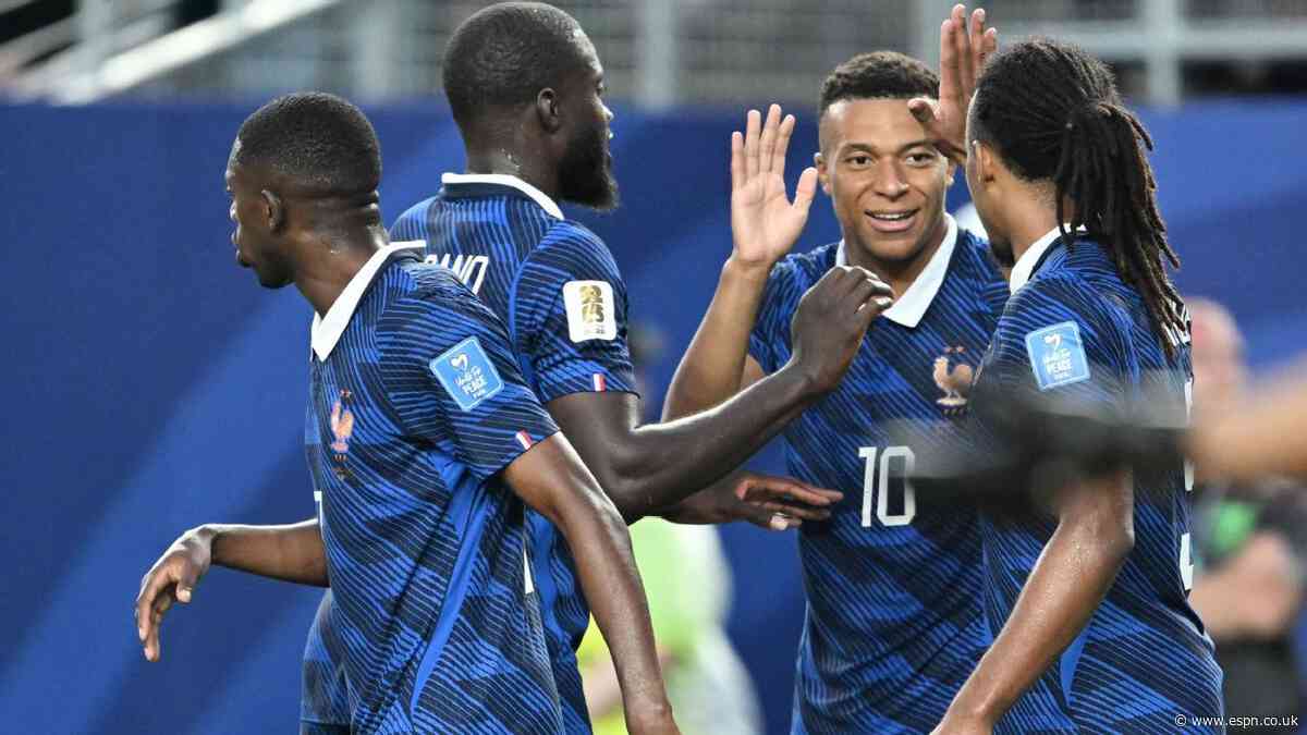 Mbappé makes it rain as storms delay France win