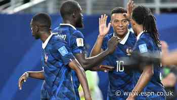 Mbappé makes it rain as storms delay France win
