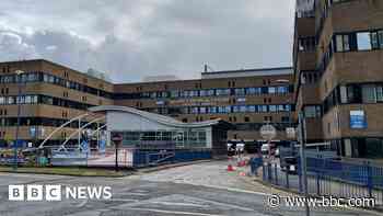 Two men arrested over hospital mortuary practices