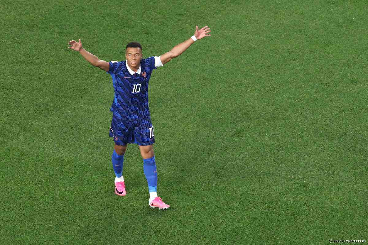 Kylian Mbappe makes a statement as France overcome two-hour storm delay to beat Iraq at World Cup