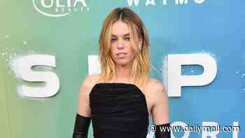 Supergirl star Milly Alcock stuns in black as she leads stars at film's premiere amid backlash over her looks