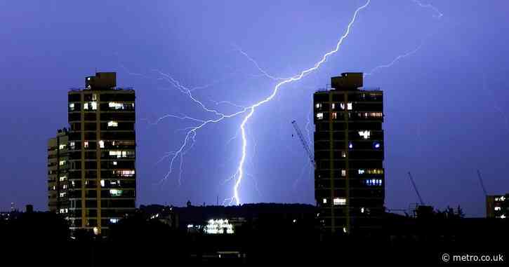 UK heatwave latest: House bursts into flames after being struck by lightning in thunderstorm