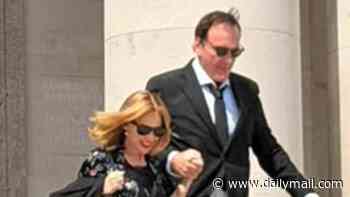 Kylie Minogue dips her toe back into acting as she holds hands with Quentin Tarantino while shooting new film in Porthcawl