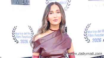 Hollywood nepo baby walks the red carpet with her Emmy-winning TV star dad at The Vanishing Tour premiere