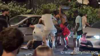 Fresh footage shows violence at French music festival where women were injected with date-rape drugs amid carnage - as one woman describes being 'attacked by North Africans'