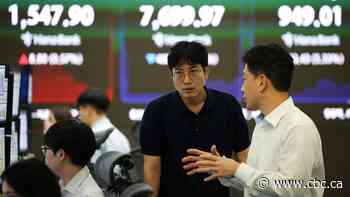 Tech stocks drop, pulling world shares down