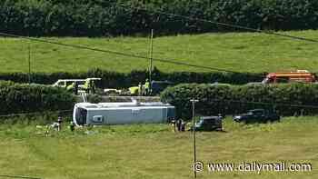 'Major incident' declared after bus crashes on busy roundabout in Wales 'leaves dozens injured': Air ambulances on scene as public urged to stay away