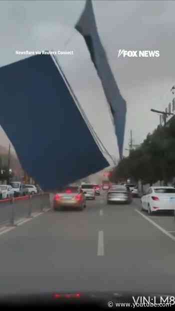 Powerful winds RIP steel roof onto vehicles in China #foxnews #news #shorts #china #weather