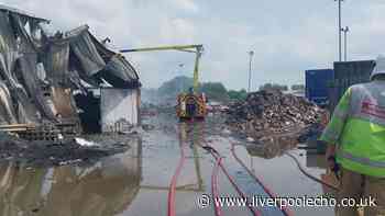 Fire crews to spend second night at scene of Widnes blaze