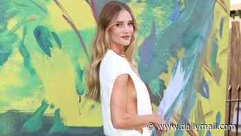 Rosie Huntington-Whiteley dazzles in a cut-out white gown as she leads the stars at The Serpentine Gallery Summer Party