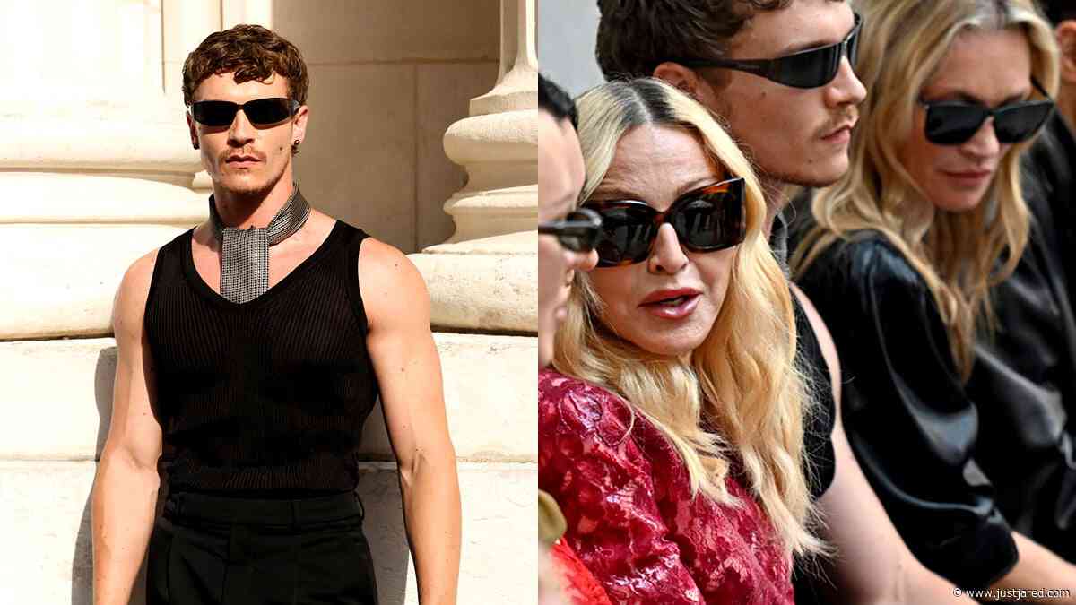 Connor Storrie Sits Between Icons Madonna & Kate Moss at Saint Laurent’s Paris Show