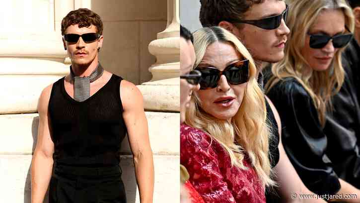 Connor Storrie Sits Between Icons Madonna & Kate Moss at Saint Laurent’s Paris Show