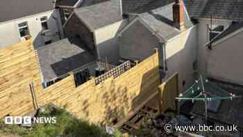 Homeowner loses battle to keep 'overbearing' timber staircase in garden
