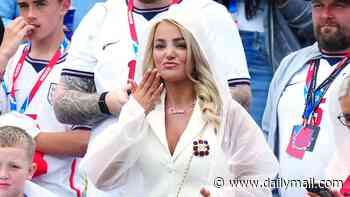 Megan Pickford blows a kiss in the stands as she and Ellie Watkins lead the WAGs at England's second World Cup game against Ghana