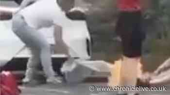 Woman is critical after her clothes catch fire in the street
