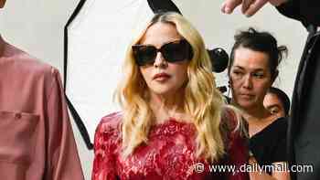 Madonna, 67, turns heads as she rocks a red lace minidress at Saint Laurent's star-studded show during Men's Paris Fashion Week
