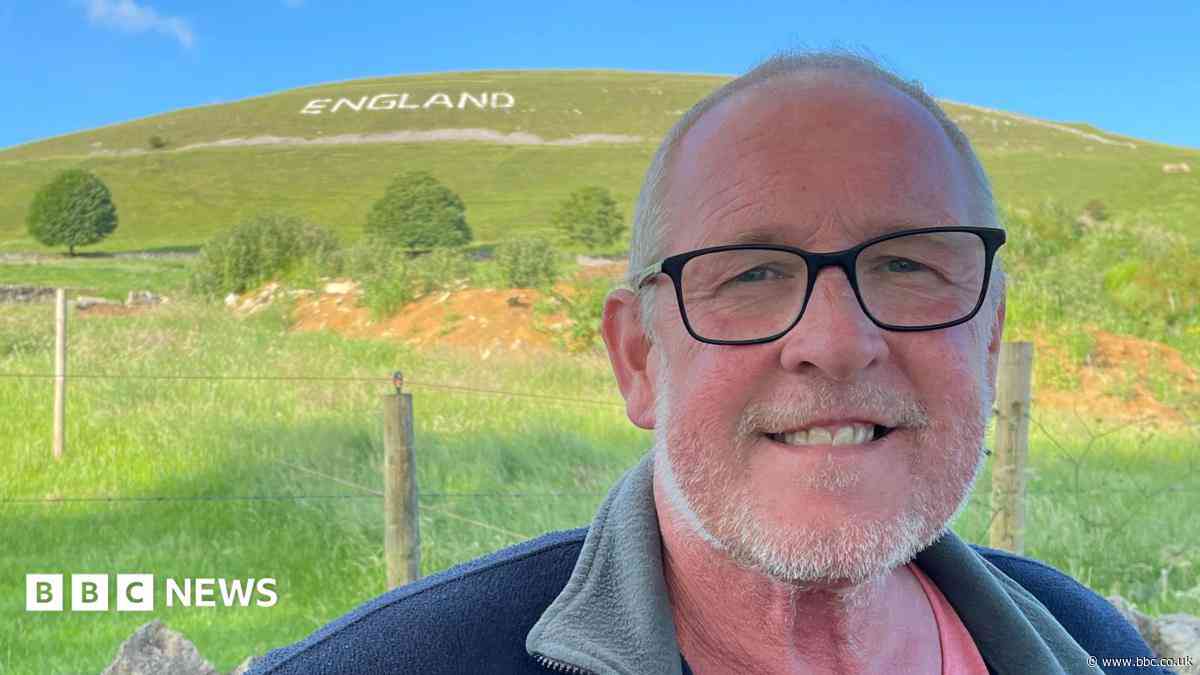Village's huge England message seen from the sky