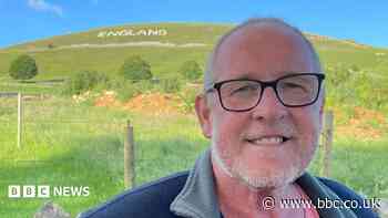 Village's huge England message seen from the sky